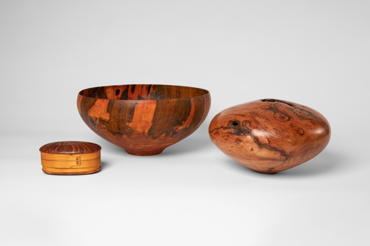 Left to Right:
Thomas Marainen, Butter Box, c. 2006. Birch. 3 ½ x 7 x 4 ½ in.  Gift of Courtenay McGowen, 2016-233-003a-b; Gene Blickenstaff, Bowl, 1997. Star pine. 8 1/8 x 17 1/2 in. Gift of the Artist, 1998-24-002; Mike Jackofsky, Hollow Form, 2001.  Black cherry burl. 8 ½ x 13 ½ x 13in.  Gift of the Artist, 2003-53-001.