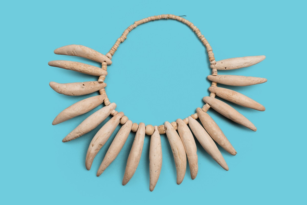 Necklace with Imitation Jaguar Teeth, 200 BCE - 1600 CE, Colombia, Sinu culture, conch on modern restringing. Collection of Mingei International, The Bead Museum Collection, Gift of Gabrielle Liese.