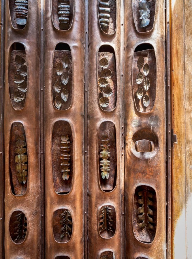 Detail of the laundry room door, designed and crafted by C. Carl Jennings, for his family home. Photo by Darren Bradley.