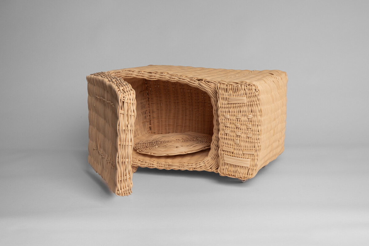 India Thompson (Los Angeles, California, b. 1995), Microwave, 2025. Woven reed. 12 x 20 1/2 x 13 1/4 in. Courtesy of the Artist. Photo by Ron Kerner.