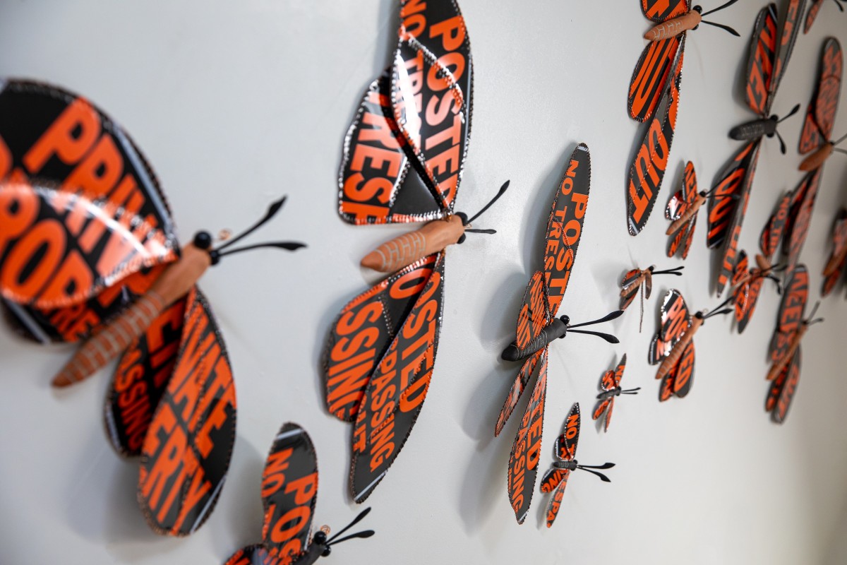 Gail Schneider's butterfly sculptures made from "No Trespassing" signs