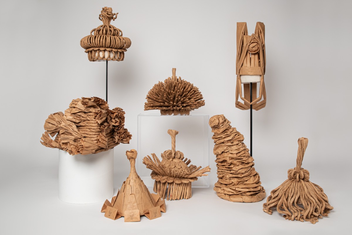 A selection of hats by moses from Mingei International Museum's permanent collection.