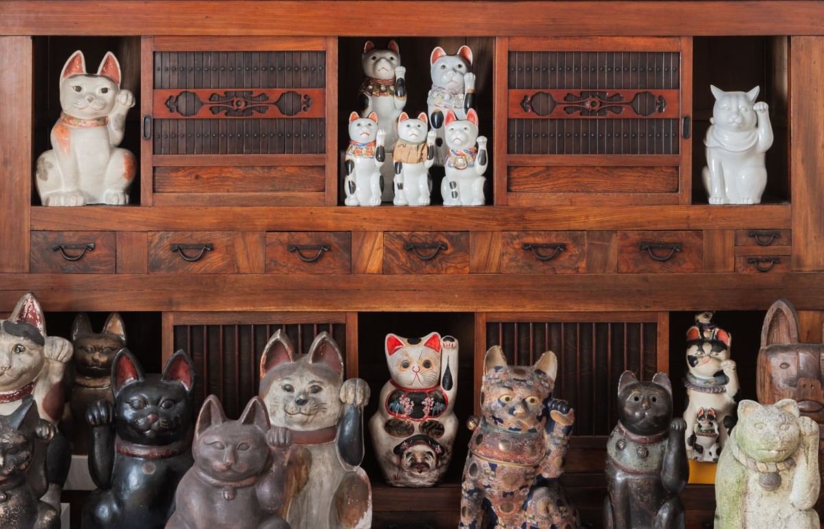 Image of Maneki Nekos from the permanent collection of Mingei International Museum. Photo by Lynton Gardiner.