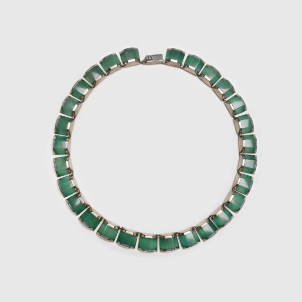 This necklace is made of small rectangular jelly jade stones set in silver.