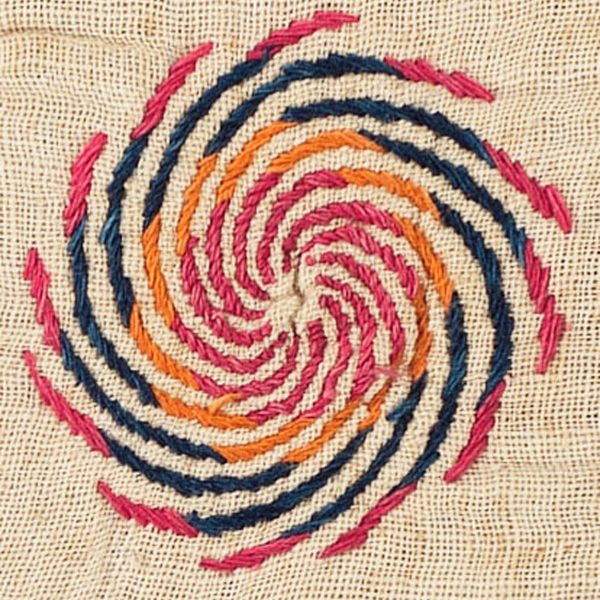 Detail of a traditional design element, the wheel or pinwheel symbolizes the eternal cycle of life on a Cover (Kantha), 20th Century, West Bengal, India, recycled cotton sari, cotton. Collection of Mingei International Museum. Gift of Stephen Huyler.