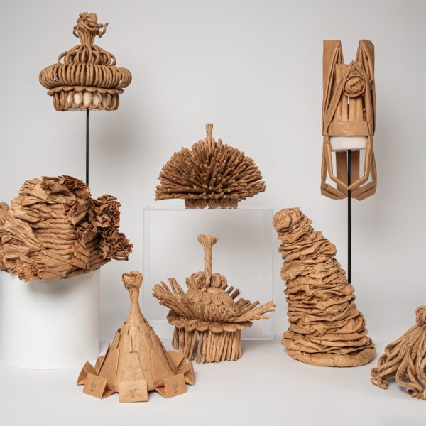 A selection of hats by moses from Mingei International Museum's permanent collection.